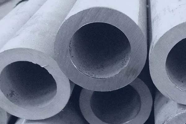 What is the manufacturing background and key details of Q235 straight seam welded steel pipe