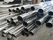 What causes stainless steel pipes to turn black, and what should be done