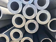 What are the causes and adjustment measures for uneven wall thickness in steel pipes